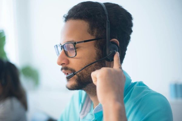 Call center representative delivering customer experience strategy support