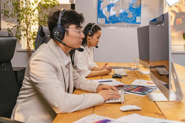 Team of call center agents handling customer inquiries during a bad customer service situation