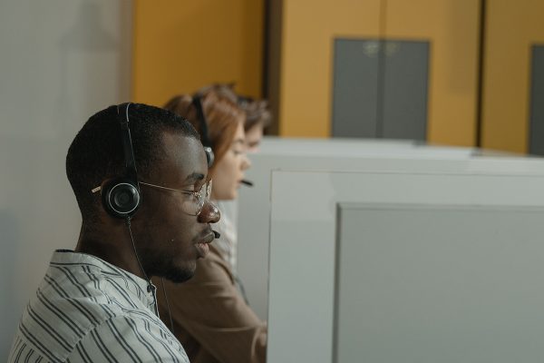Outsourced phone support representative resolving customer concerns